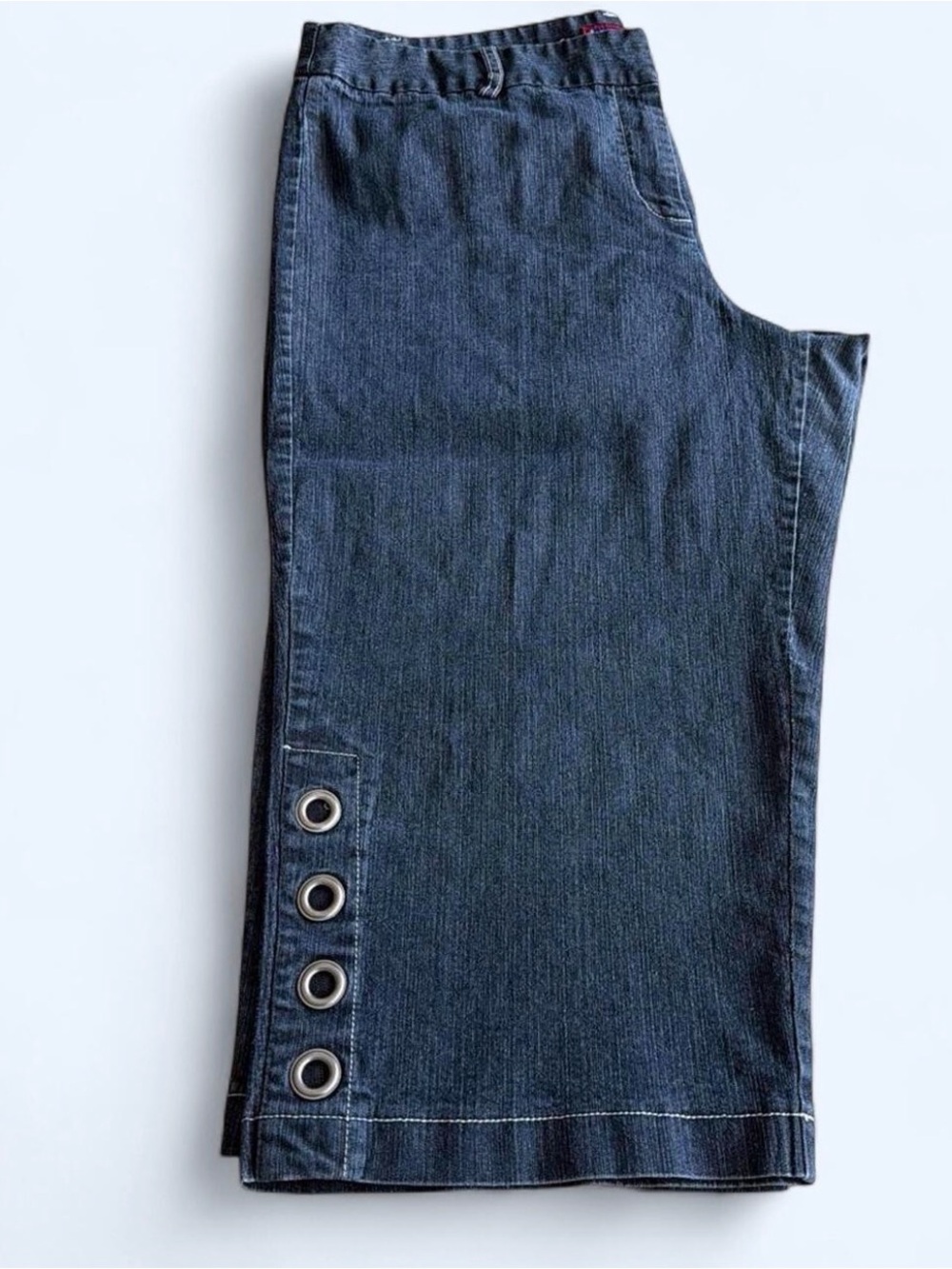 Women’s plus size denim capris by Westport. Dark wash, grommet details, size 16W